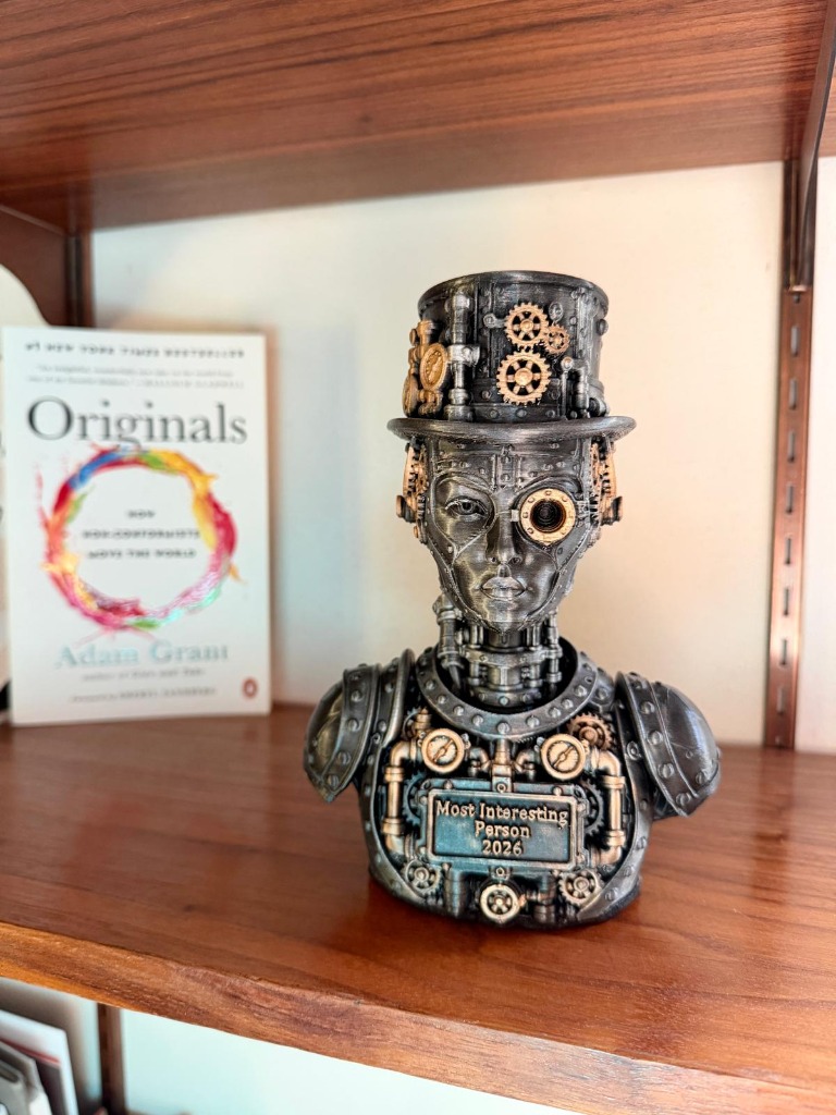 2026 MIP trophy displayed on a wooden shelf